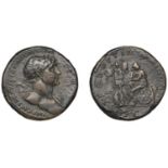 Trajan, Sestertius, 105, laureate bust right, draped over far shoulder, rev. Dacia seated le...