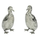 A pair of German silver peppers modelled as Great Auks, early 20th century, by Neresheimer...