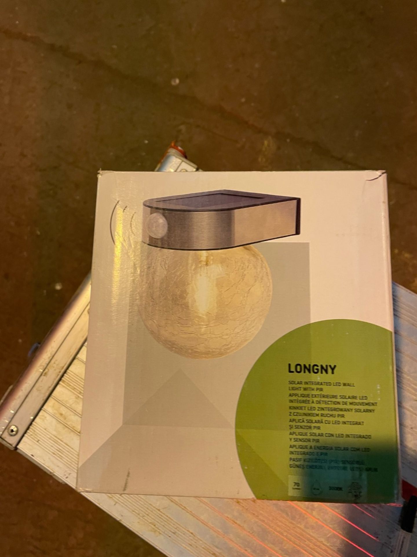 Solar led exterior wall light. New in box