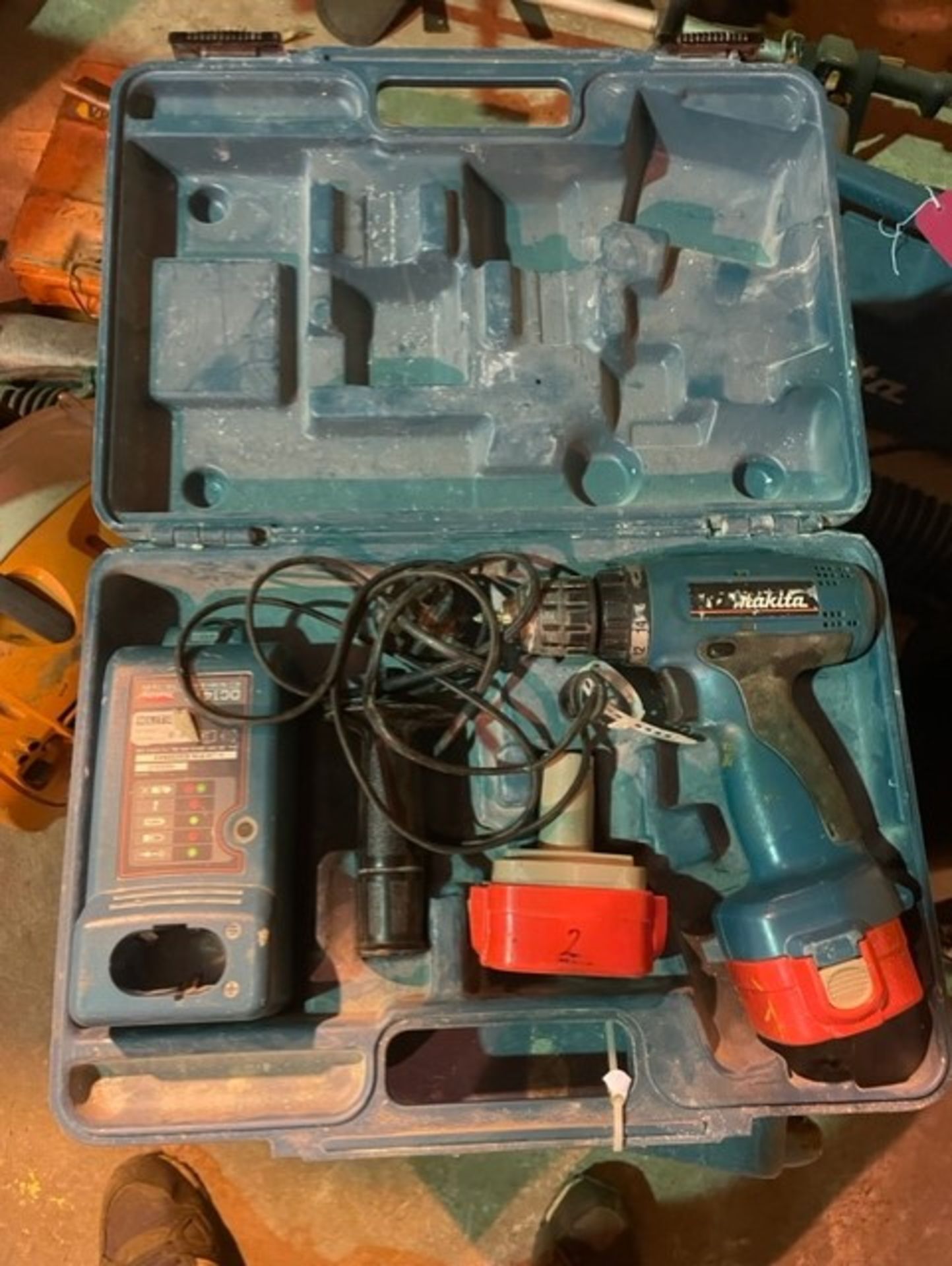 Makita drill complete with charger and 2 batteries