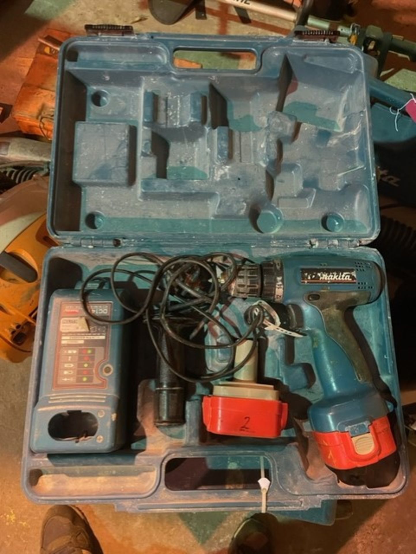 Makita drill complete with charger and 2 batteries - Image 2 of 2