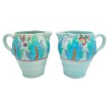 TWO CLARICE CLIFF NEWPORT POTTERY MOULDED JUGS decorated with a band of leaves and fruit, green