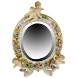 PAIR OF DRESDEN HELENA WOLFSOHN PORCELAIN MIRRORS 19TH CENTURY after Meissen, the oval mirrors
