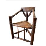 OAK TURNERS CHAIR 19TH CENTURY the trepizochial back with bobbin turned arms, supported by a