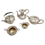 GEORGE V SILVER TEA SERVICE  JAMES DIXON AND SONS, SHEFFIELD, 1917 & 18 the semi-lobed bodies with