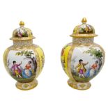 PAIR OF DRESDEN HELENA WOLFSOHN PORCELAIN COVERED VASES LATE 19TH CENTURY the baluster sides painted