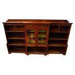 VICTORIAN WALNUT BREAKFRONT LIBRARY BOOKCASE CIRCA 1880 the shaped top above one central frieze