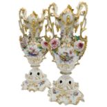 LARGE PAIR OF PARIS PORCELAIN VASES 19TH CENTURY of flattened baluster form the sides with twin