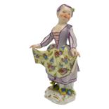 A SMALL MID 18TH CENTURY MEISSEN FIGURE OF A GIRL DANCING CIRCA 1765 shown wearing a purple bonnet