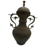 LARGE ISLAMIC COPPER COVERED URN 19TH CENTURY with a domed lid and twin scroll handles, the sides