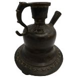 BRONZE PERSIAN HOOKAH BASE 18TH / 19TH CENTURY of typical form with a scroll handle and raised on