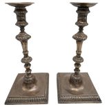 PAIR OF PAKTONG CANDLESTICKS CIRCA 1760 the baluster stems raised on a square foot 24.8cm high