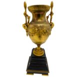 FRENCH GILT-BRONZE URN LATE 18TH CENTURY of baluster form, the sides decorated in relief with a