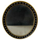 IRISH VICTORIAN GILT AND PARCEL-EBONIZED MIRROR 19TH CENTURY the oval frame mounted with faceted