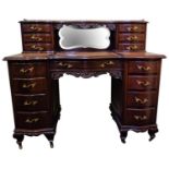 LATE VICTORIAN MAHOGANY WRITING DESK CIRCA 1890-1900 the raised back with a three quarter brass