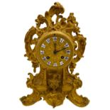 LOUIS XV STYLE GILT-BRONZE CLOCK 19TH CENTURY the circular dial with white enamel chapters and