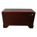 GEORGE III MAHOGANY TRUNK MID 18TH CENTURY with brass side carrying handles, the hinged top with a