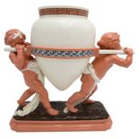 LARGE MINTON CENTRE PIECE LATE 19TH CENTURY modelled as two cherubs carrying an oversized amphora,