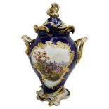 MEISSEN PORCELAIN COVERED VASE LATE 19TH CENTURY of ornate rococo baluster form, the sides painted