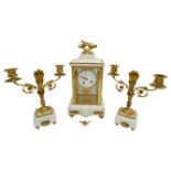 LOUIS XVI STYLE MARBLE AND GILT-BRONZE MOUNTED CLOCK GARNITURE CIRCA 1900 the four glass clock