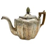 LATE GEORGE III SILVER TEAPOT THOMAS HAYTER, LONDON 1811 the lobed oval sides with foliate