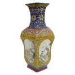 FAMILLE ROSE HEXAGONAL BALUSTER VASE REPUBLIC PERIOD (1912-1949) the sides finely painted with