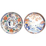 TWO JAPANESE IMARI DISHES MEIJI PERIOD (1868-1912) one decorated with pagoda in a garden view, the
