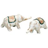 PAIR OF JAPANESE PORCELAIN ELEPHANTS MEIJI PERIOD (1868-1912) modelled as the beast striding