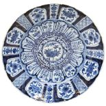 LARGE CHINESE EXPORT BLUE AND WHITE DISH KANGXI PERIOD (1662-1722) the central flower medallion