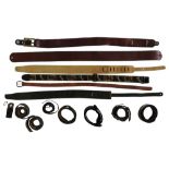 A GOOD COLLECTION OF GUITAR STRAPS, mostly leather and dating from the 1970s onwards and also