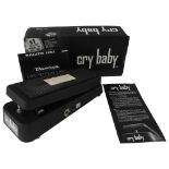 A DUNLOP CRY BABY WAHWAH PEDAL MODEL GCB-95 boxed as new and appears to be unused.