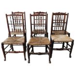 A SET OF SIX 19TH CENTURY FRUIT WOOD COUNTRY CHAIRS, with spindle backs and rush seats
