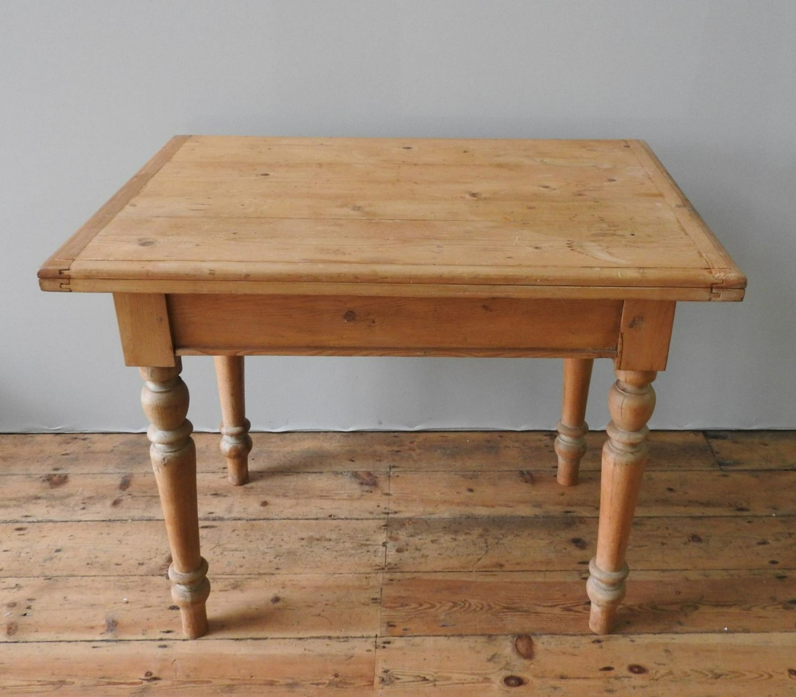 A VICTORIAN WAXED PINE METAMORPHIC KITCHEN TABLE, circa 1880's, with a fold-over swivel top - Image 2 of 4
