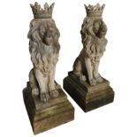 A PAIR OF IMPRESSIVE RECONSTITUTED STONE SEATED REGAL LION STATUES ON PLINTH BASES, with removable