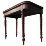 A GEORGE III MAHOGANY FOLDING TEA TABLE, the swivel action fold over top supported by four turned