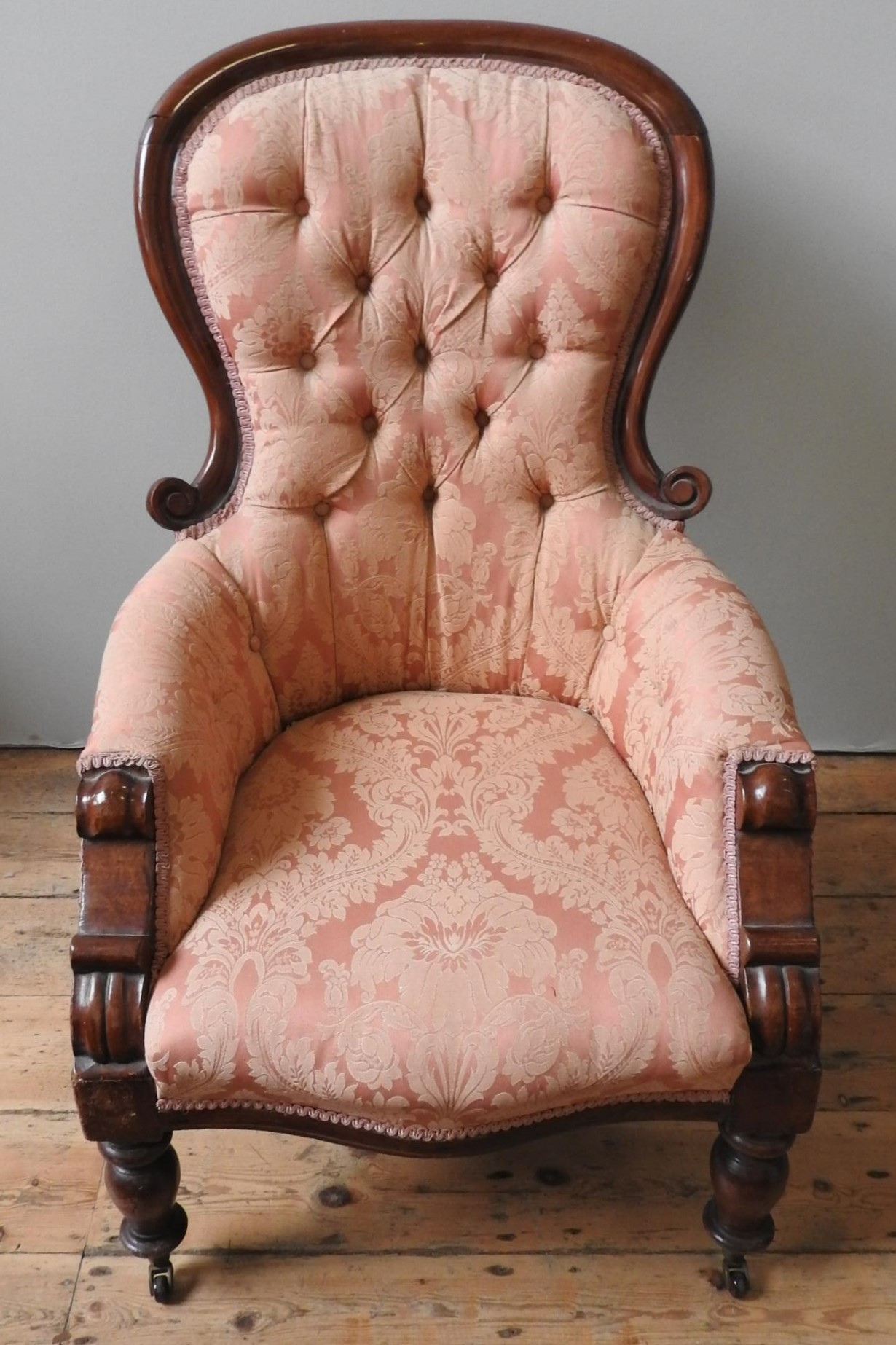 A VICTORIAN MAHOGANY NURSING CHAIR, with scroll carved spoon back, buttoned upholstery supported - Image 3 of 5
