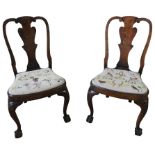 A SET OF FOUR 19th CENTURY WALNUT QUEEN ANNE STYLE CHAIRS, with tapestry seat panels and claw and