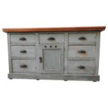 A 19TH CENTURY PAINTED PINE KITCHEN DRESSER BASE, with seven drawers and a central cupboard space,