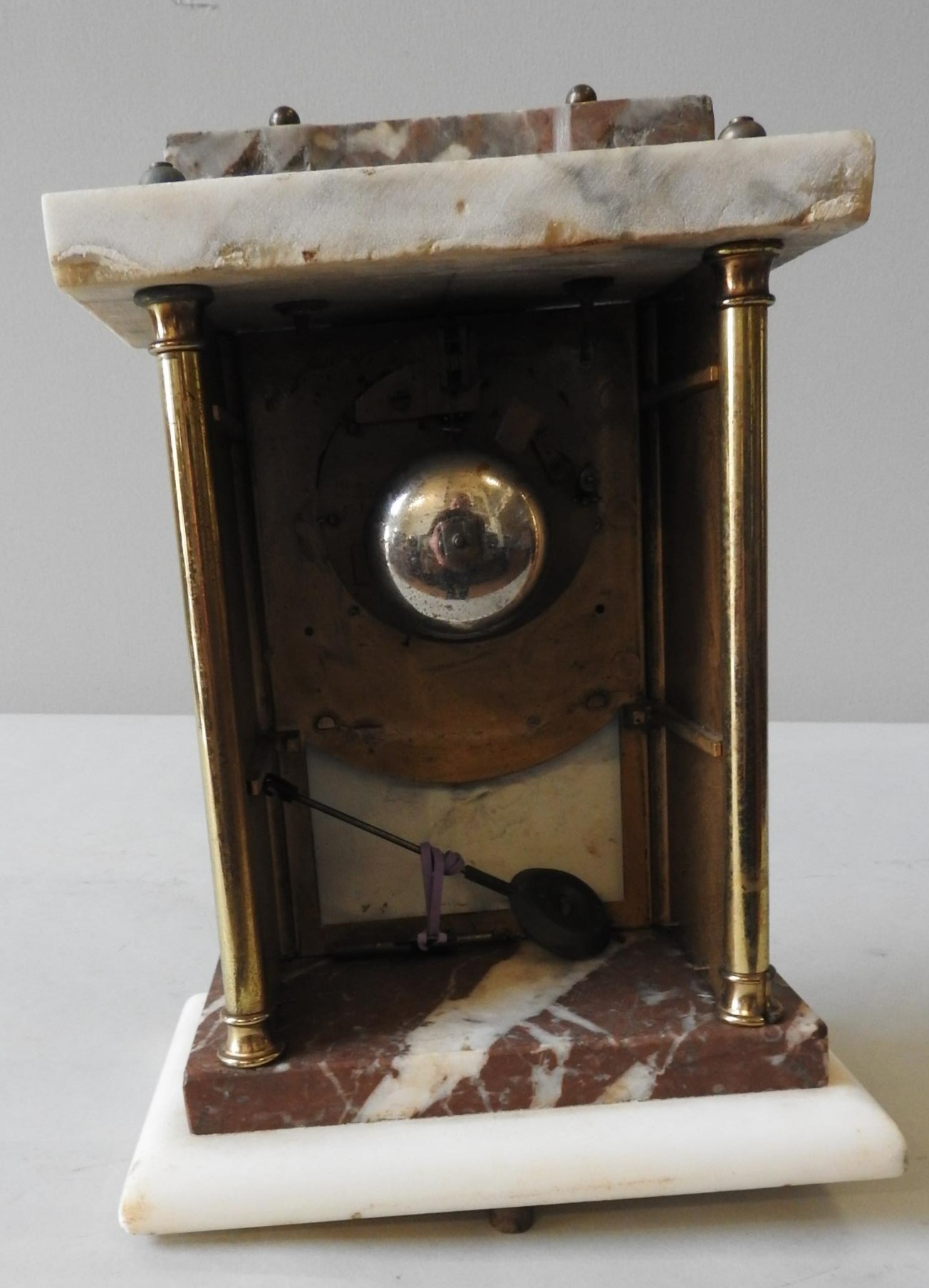 A 19TH CENTURY CONTINENTAL ALABASTER AND MARBLE CHIMING MANTEL CLOCK, the front decorated with a - Image 3 of 3