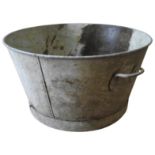 A GALVANISED STEEL TAPERED GARDEN TUB WITH TWO HANDLES, 45cm high x 82cm diameter