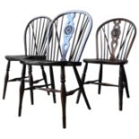 THREE 19TH CENTURY ELM SEAT SPINDLE BACK WINDSOR CHAIRS, two with carved central splats, all with