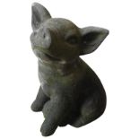 A RECONSTITUTED STONE FIGURE OF A SEATED PIGLET, 33cm high