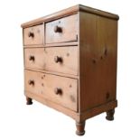 A 19TH CENTURY WAXED PINE CHEST OF FOUR DRAWERS, comprising two short drawers over two long drawers,