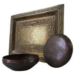 INDIAN RECTANGULAR BRASS TRAY WITH REPOUSSSE AND ENGRAVED DECORATION, early 20th century, and an