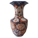 LARGE IMARI VASE OF HEXAGONAL FORM, the body with relief moulded hexagonal panels and flared rim.