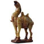 A SOAP STONE CAMEL FIGURE, 19cm high