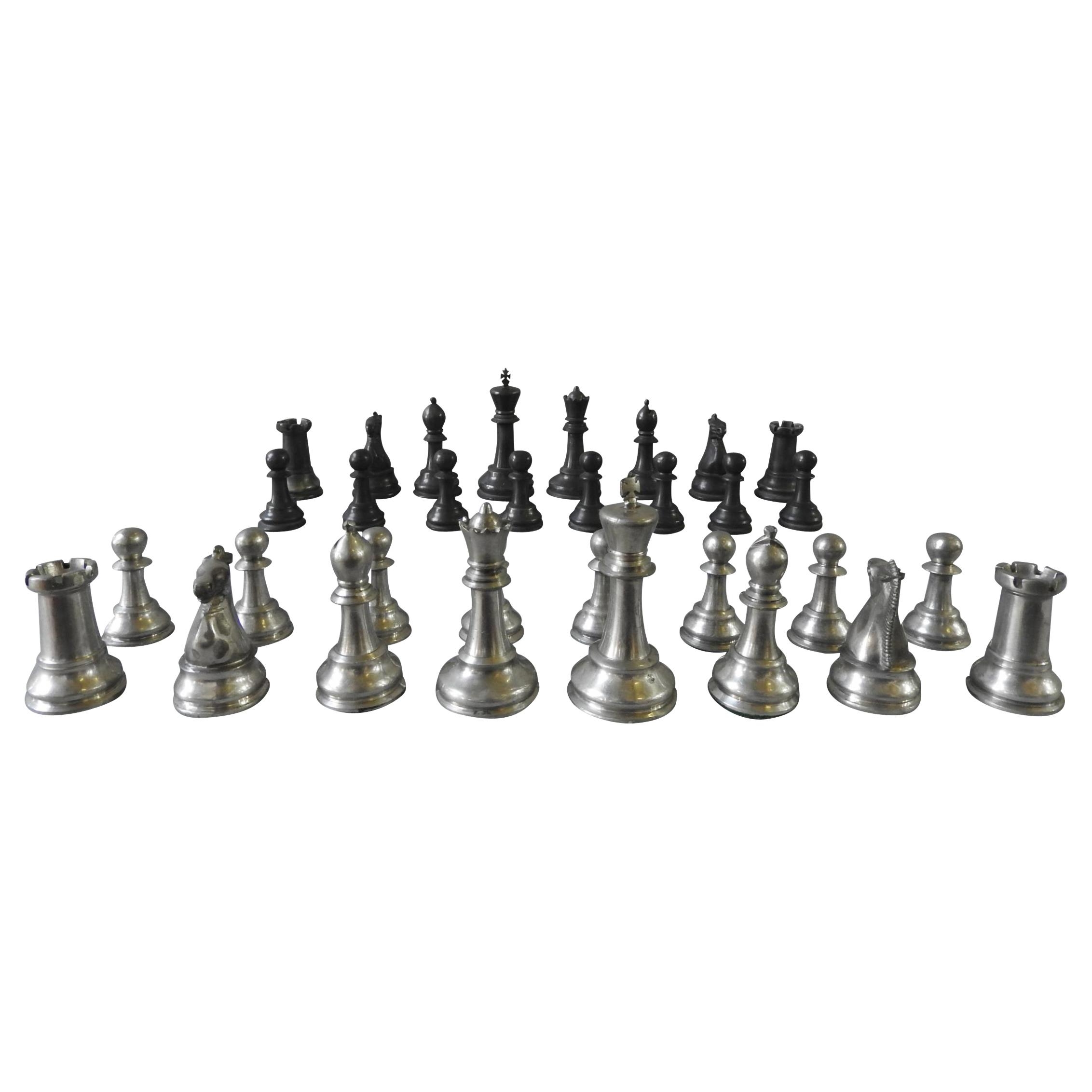 A COMPLETE SET OF 20th CENTURY PEWTER CHESS PIECES