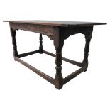 AN OAK 19TH CENTURY TABLE TOP ON A 17TH CENTURY BASE, with turned legs united by stretcher bars,