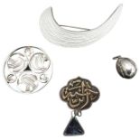 A NORWEGIAN ENAMEL AND SILVER BROOCH, an Islamic pendant, Celtic brooch and silver egg pendant