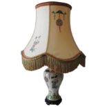 A CHINESE FAMILE VERTE BALUSTER VASE ON WOODEN STAND, drilled and converted into a table lamp,